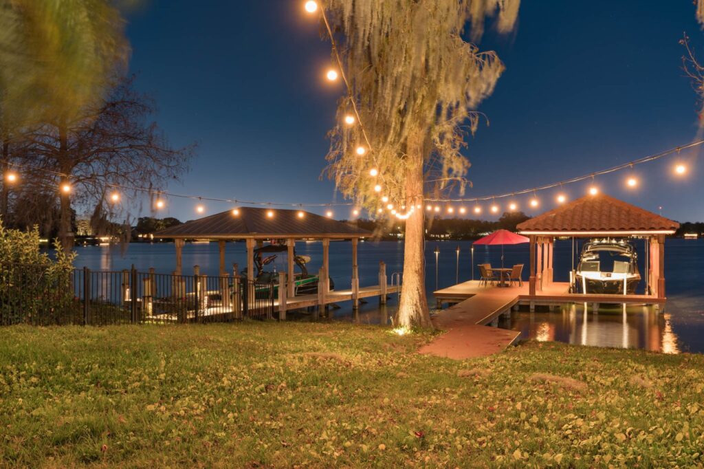 dock lighting with boat and patio set